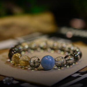 Explore our high-quality crystal bracelet, combining Green Phantom Ghost Quartz, Aquamarine, and Golden Hair Crystal for wealth and health benefits. Discover exquisite craftsmanship and guaranteed prosperity in every piece.