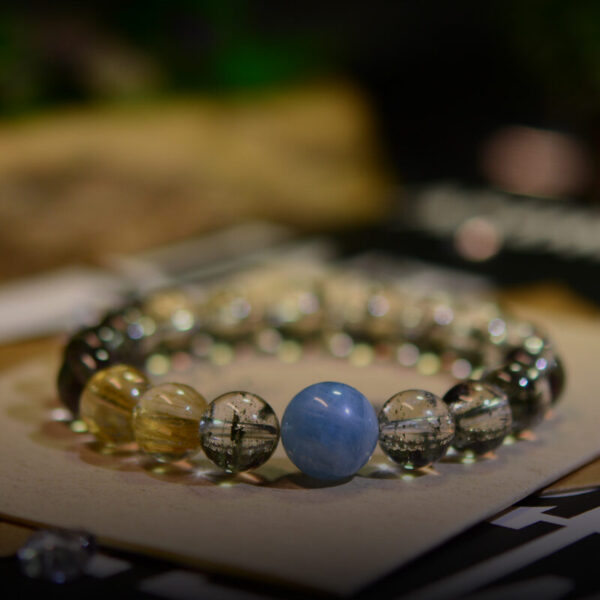 Explore our high-quality crystal bracelet, combining Green Phantom Ghost Quartz, Aquamarine, and Golden Hair Crystal for wealth and health benefits. Discover exquisite craftsmanship and guaranteed prosperity in every piece.